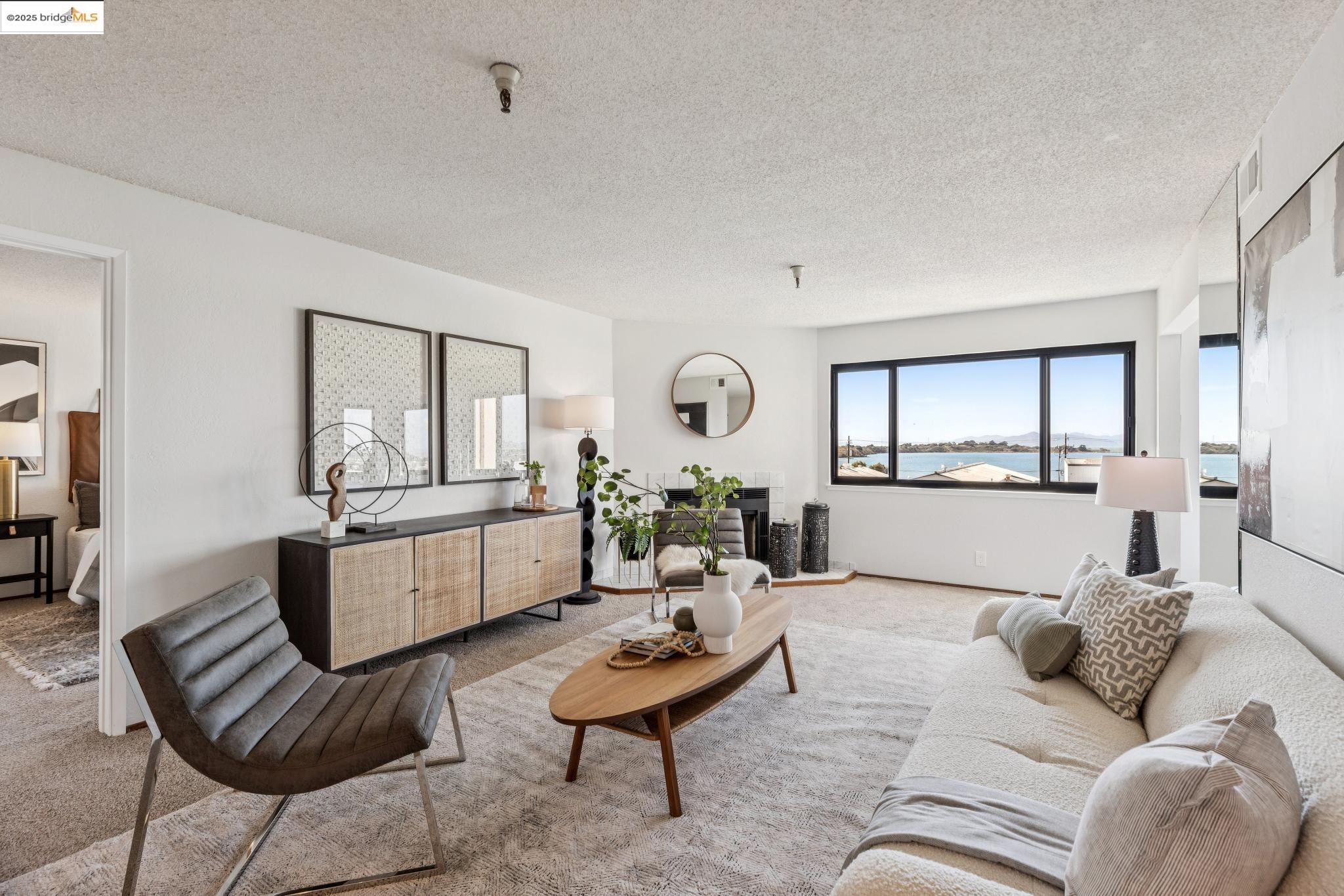 545 Pierce Street, Unit 1206 Albany, CA 94706 - Photo 6 of 44 a living room with furniture and a wooden floor