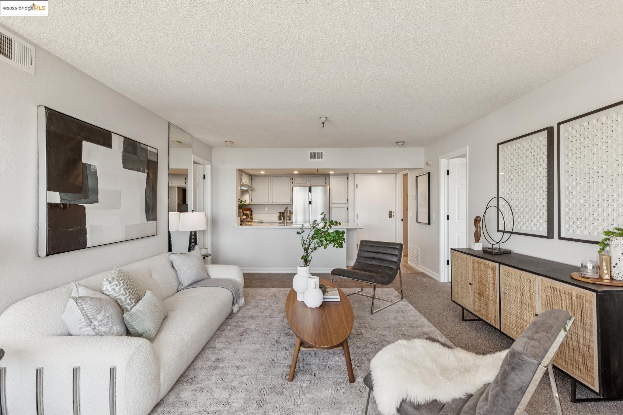 545 Pierce Street, Unit 1206 Albany, CA 94706 - Photo 9 of 44 a living room with furniture and a large window
