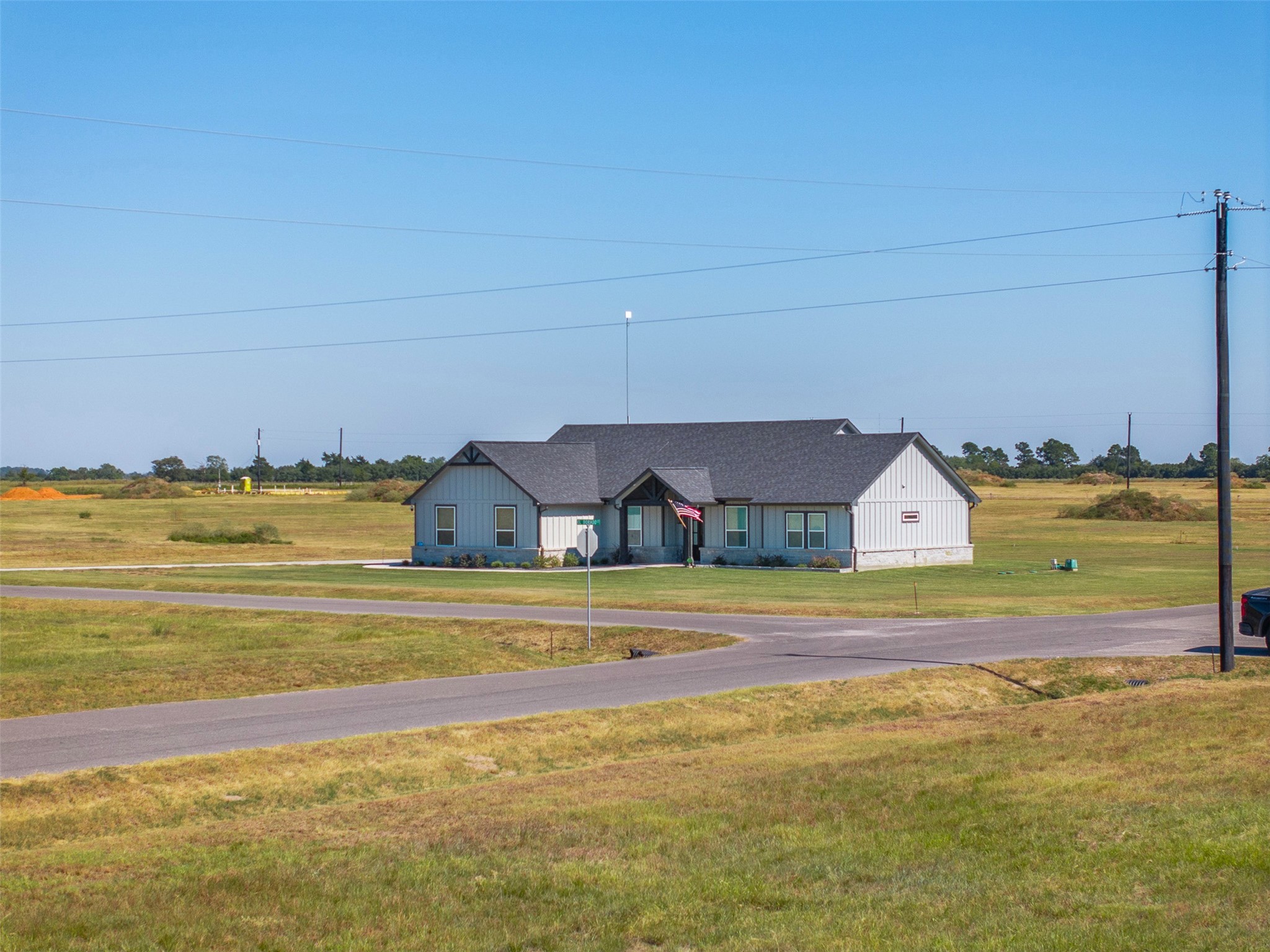 423 Ridgeview Drive Cat Spring, TX 78933 - Photo 22 of 30 a view of a house with a big yard
