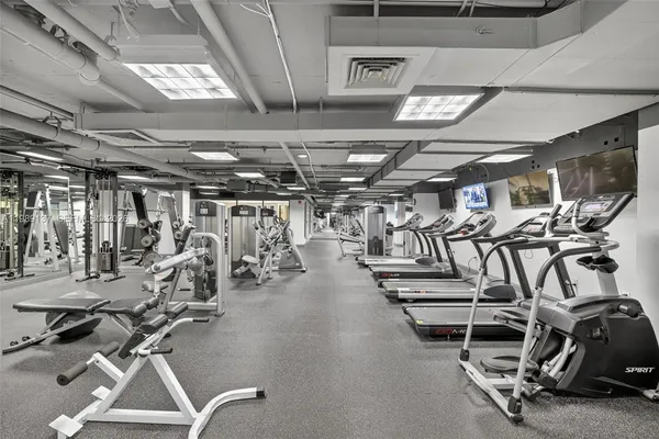 a view of a room with gym equipment