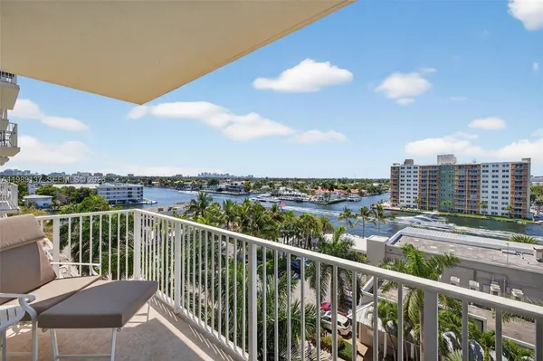 a view of a balcony with city view