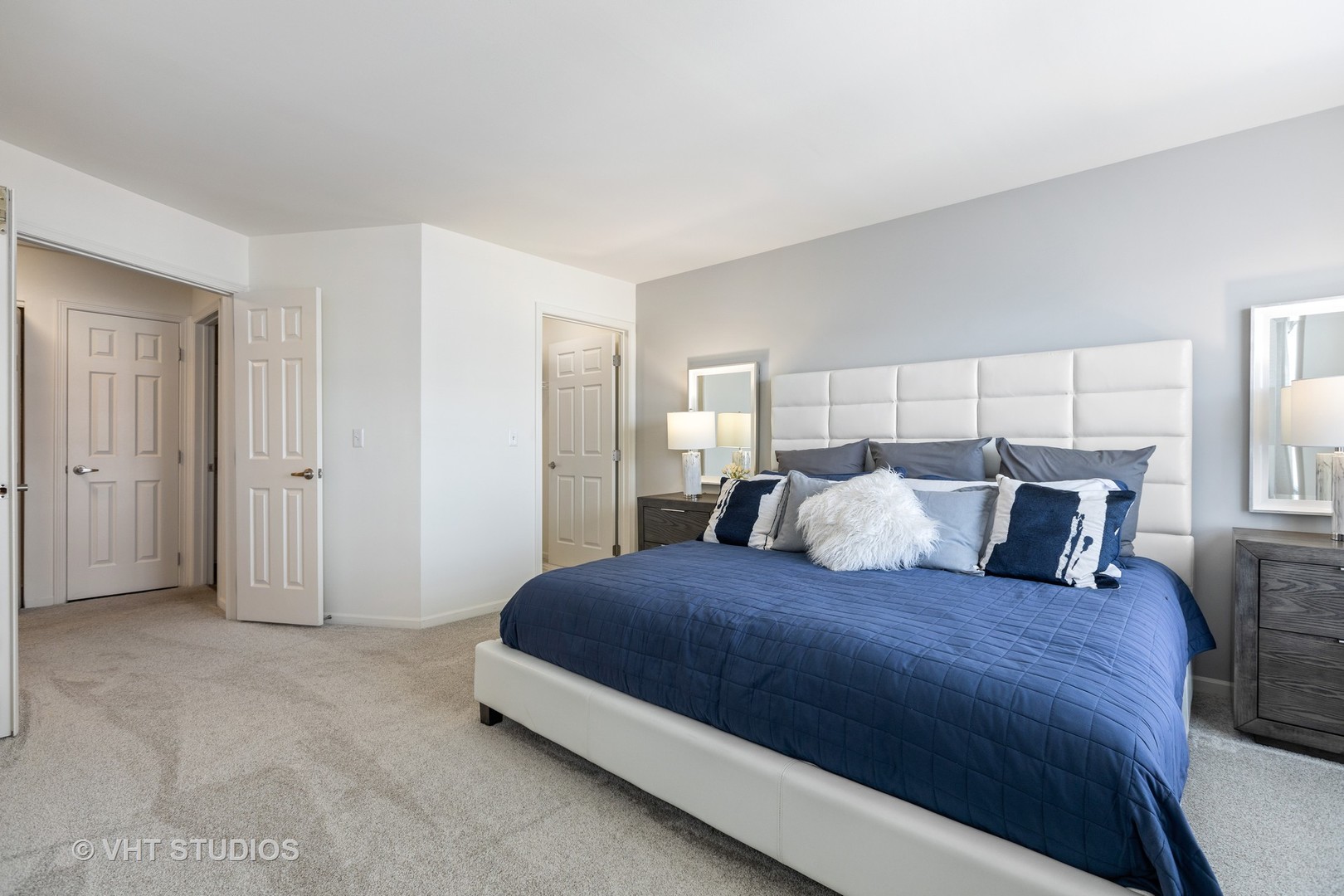 304 Sibelius Court, Unit 304 Wheaton, IL 60189 - Photo 42 of 60 a large bedroom with a bed and window