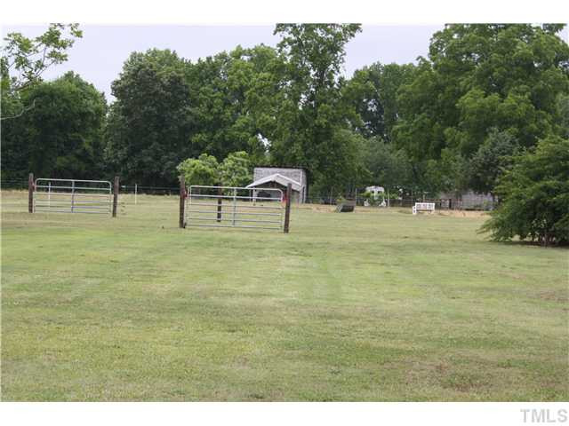 7460 Brogden Road Smithfield, NC 27577 - Photo 11 of 12 FENCED PASTURE FOR HORSES
