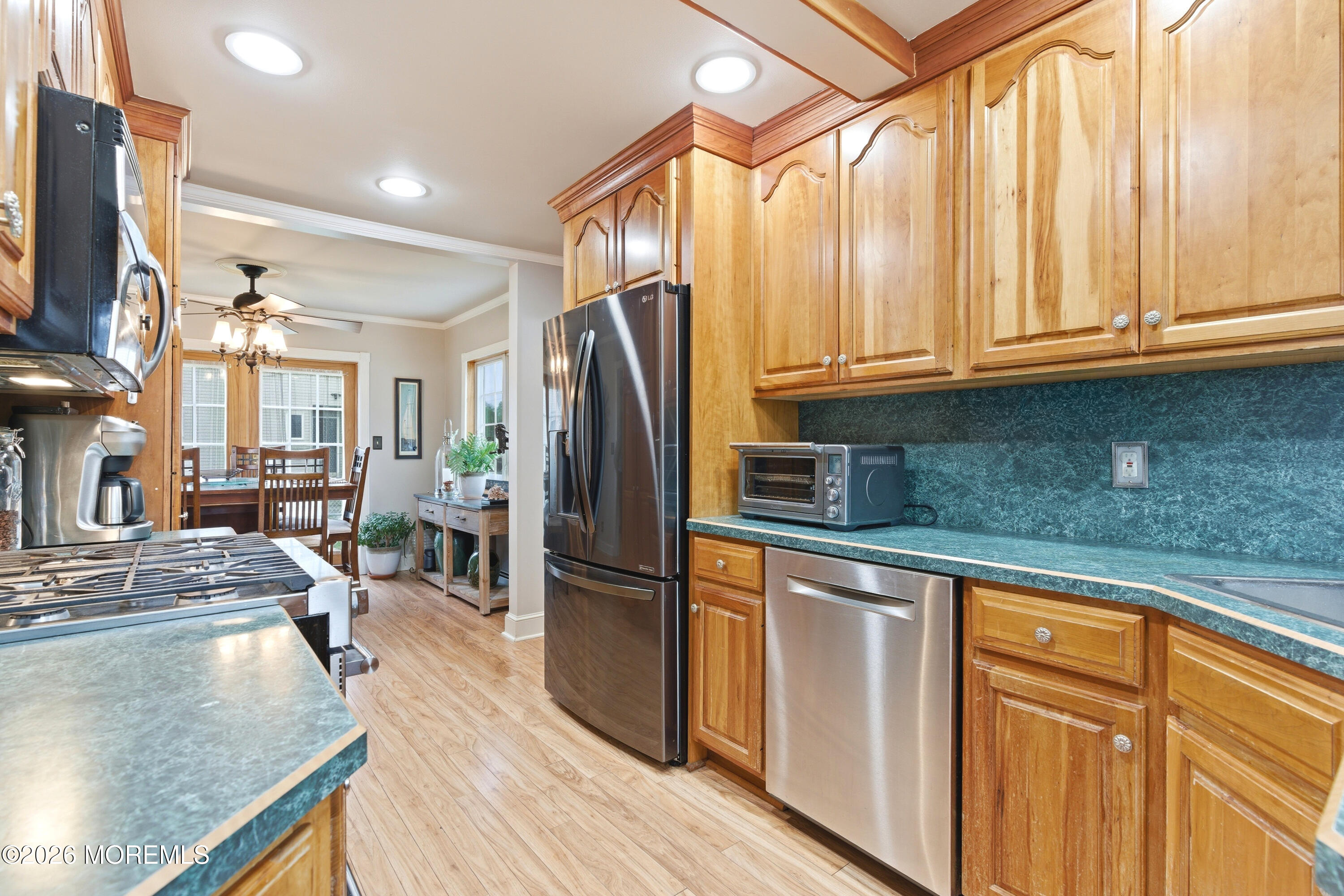 114 Ocean Boulevard Keyport, NJ 07735 - Photo 11 of 41 a kitchen with stainless steel appliances granite countertop a refrigerator and a sink