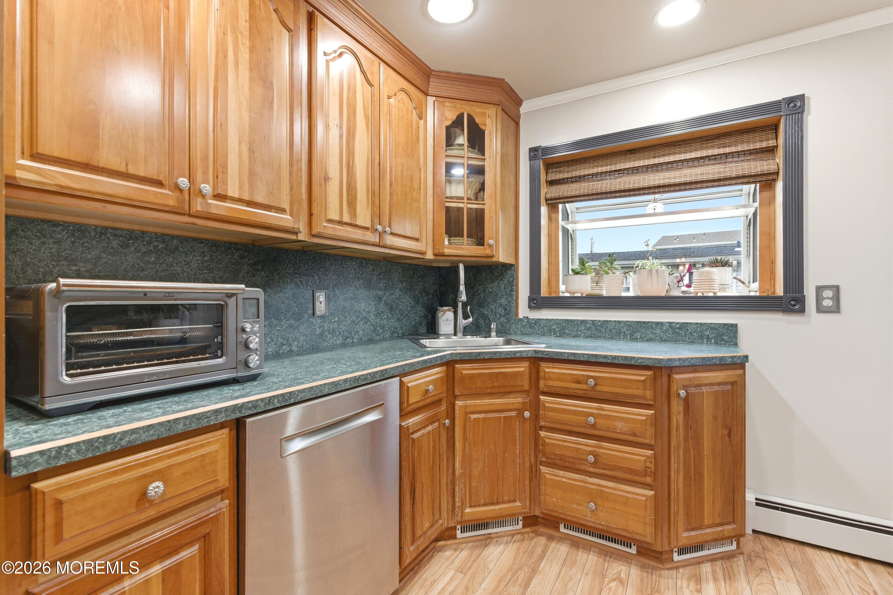 114 Ocean Boulevard Keyport, NJ 07735 - Photo 12 of 41 a kitchen with granite countertop cabinets and window