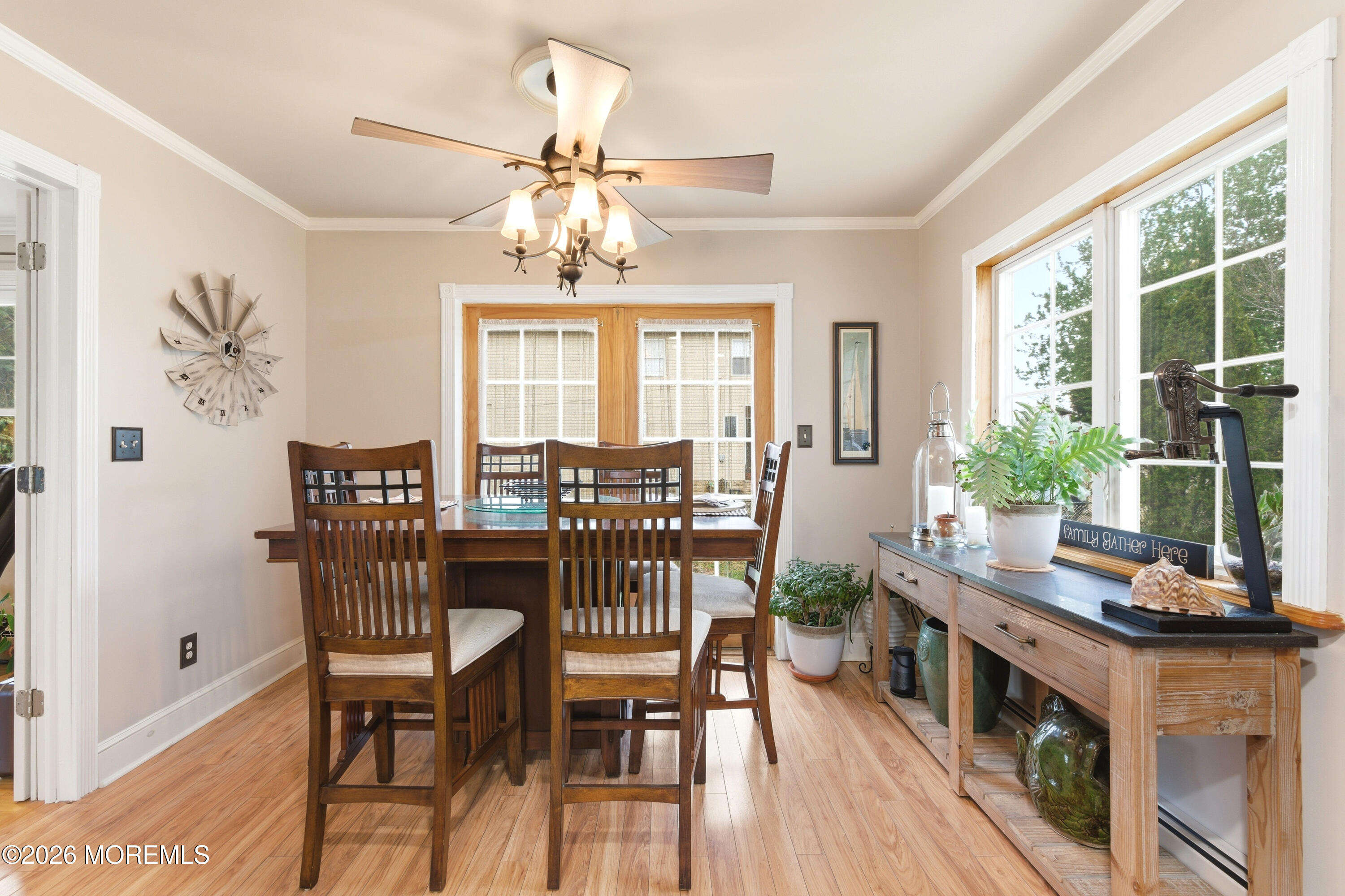114 Ocean Boulevard Keyport, NJ 07735 - Photo 15 of 41 a view of a dining room with furniture window and wooden floor