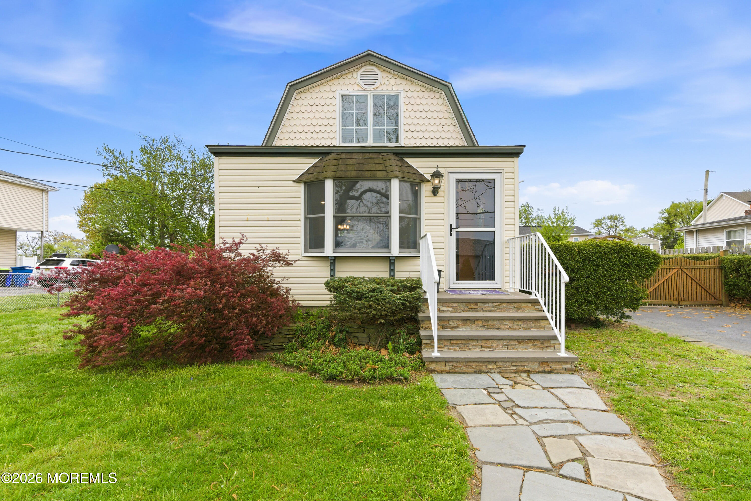 114 Ocean Boulevard Keyport, NJ 07735 - Photo 2 of 41 a front view of a house with garden
