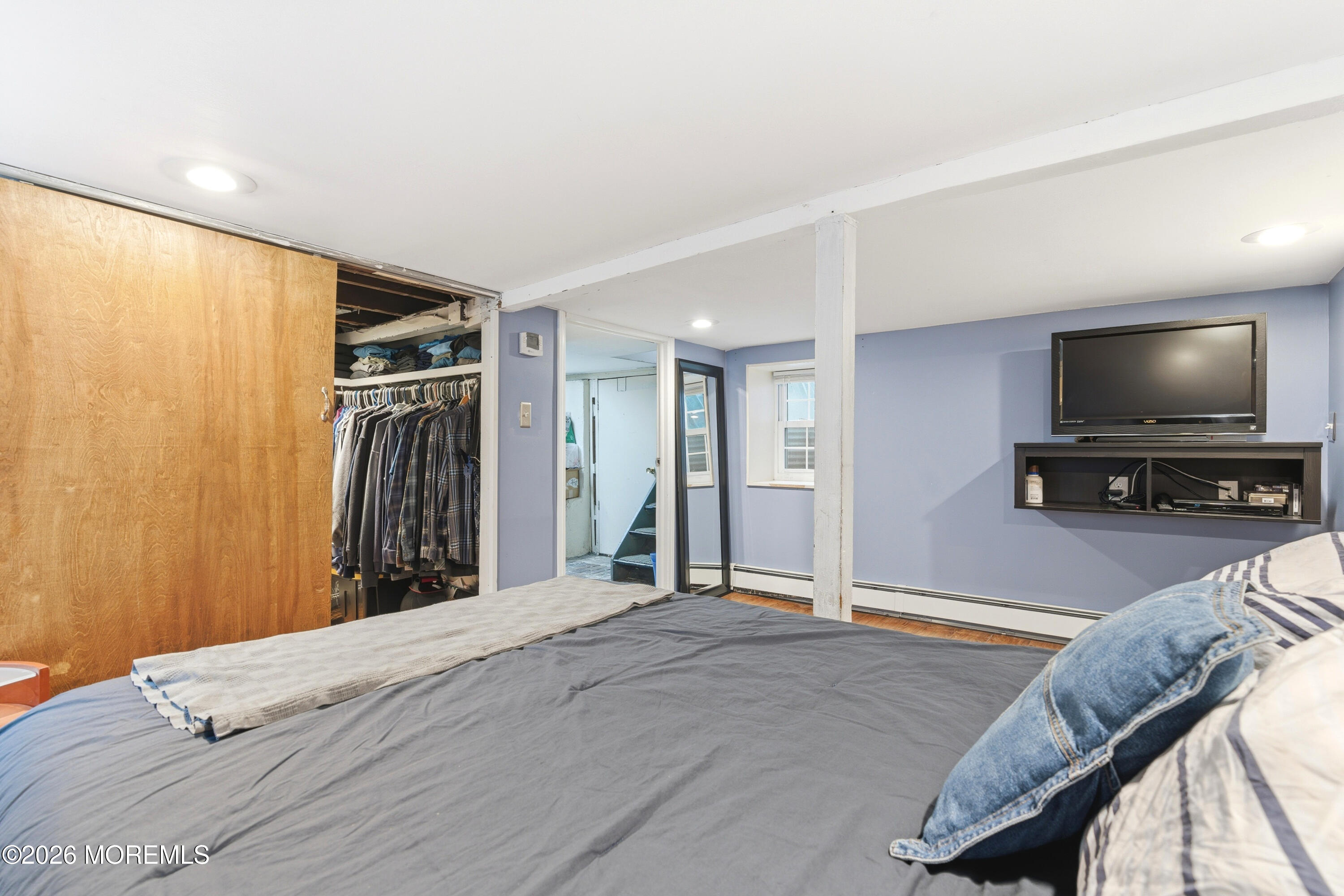 114 Ocean Boulevard Keyport, NJ 07735 - Photo 23 of 41 a view of a livingroom with furniture and a flat screen tv