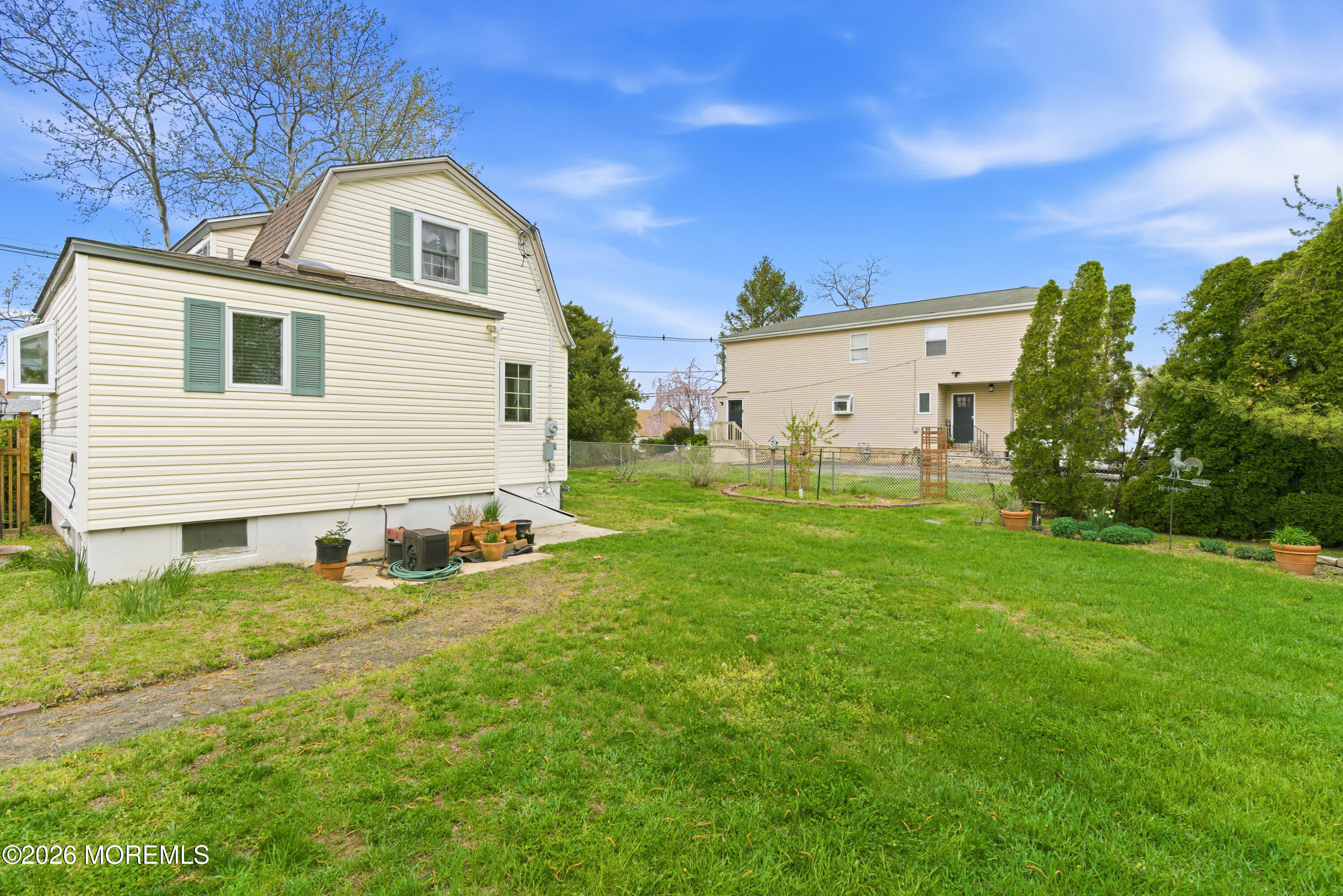114 Ocean Boulevard Keyport, NJ 07735 - Photo 28 of 41 a view of a house with a backyard