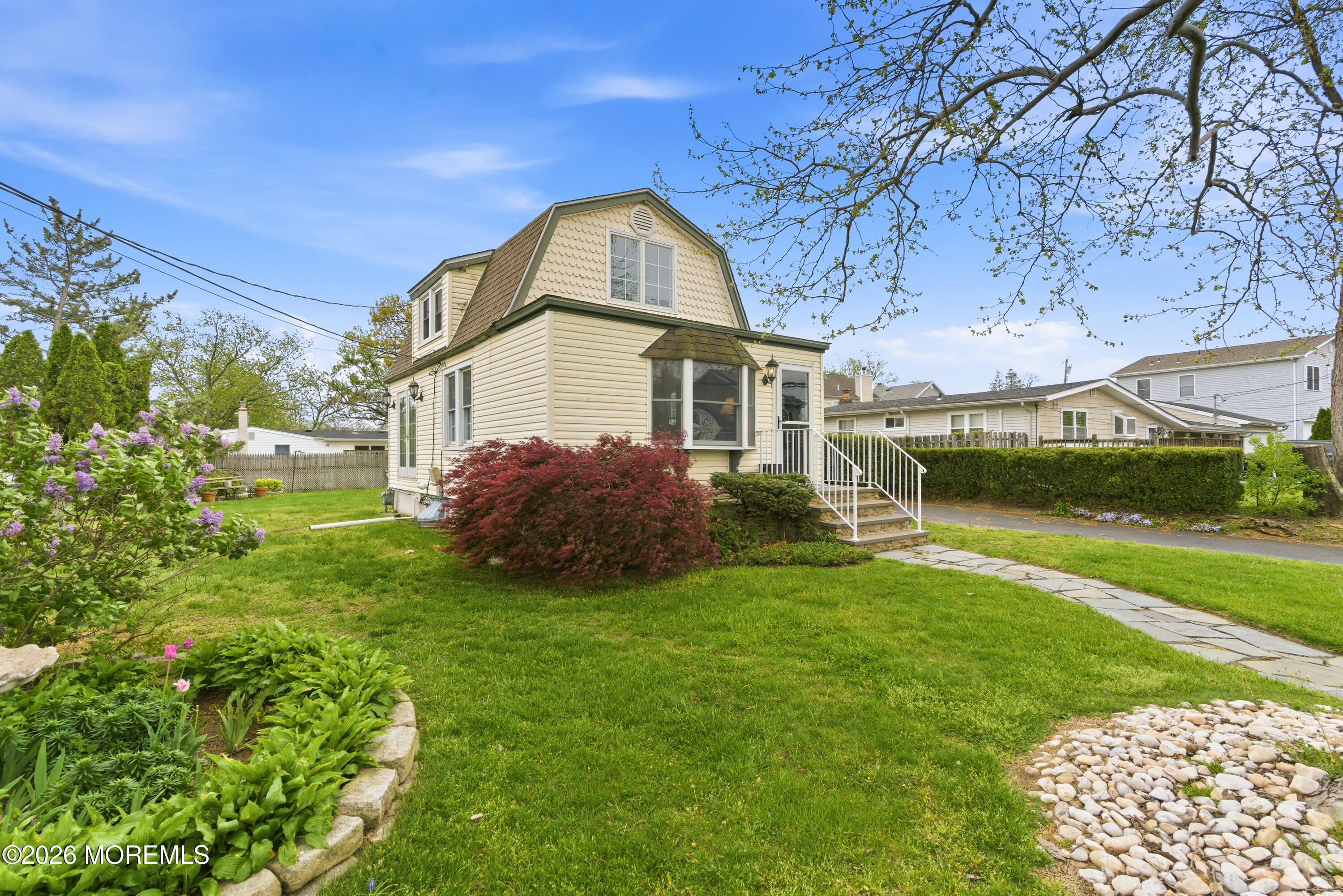 114 Ocean Boulevard Keyport, NJ 07735 - Photo 3 of 41 a view of a house with a big yard plants and large trees