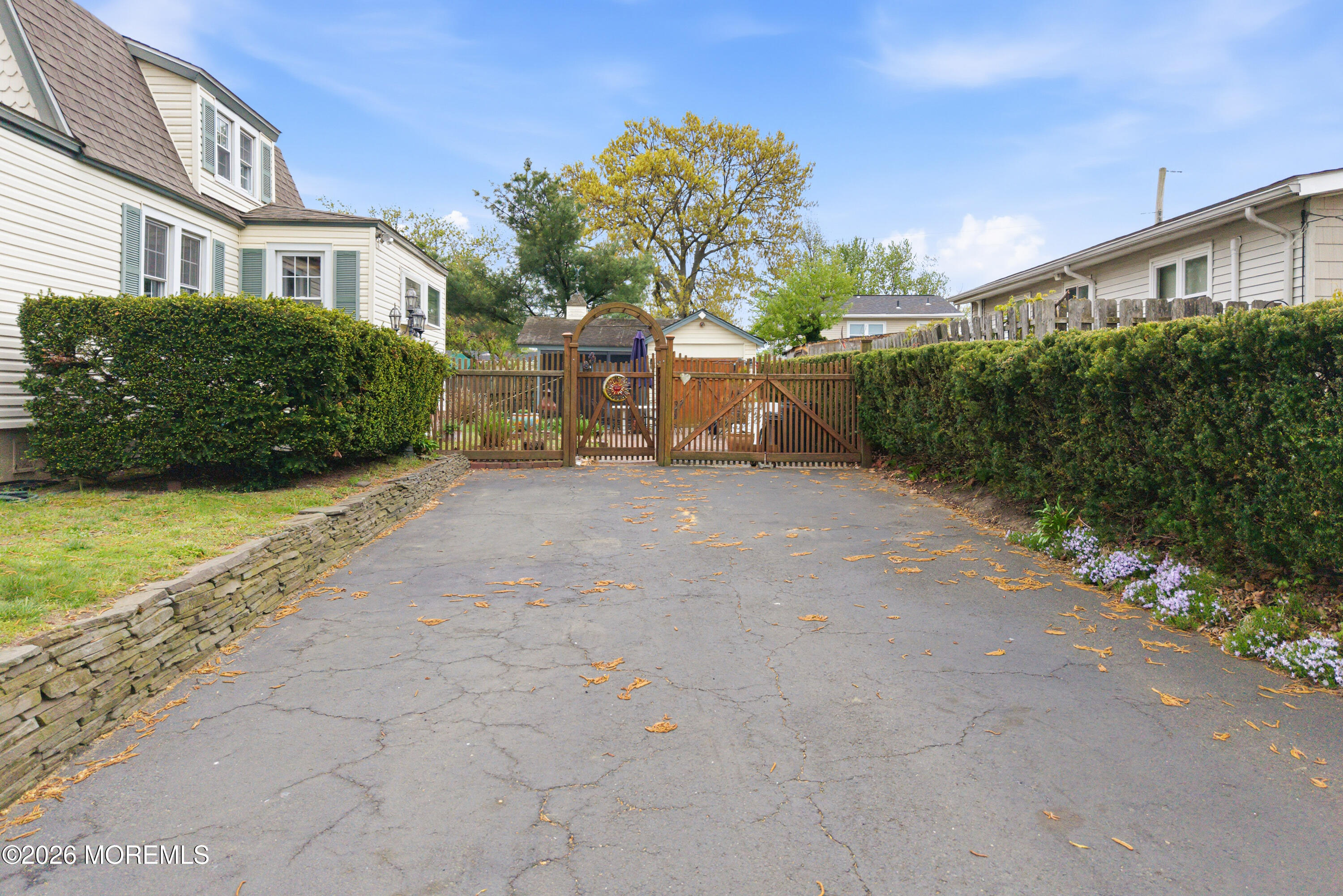 114 Ocean Boulevard Keyport, NJ 07735 - Photo 4 of 41 a view of a house with backyard and parking