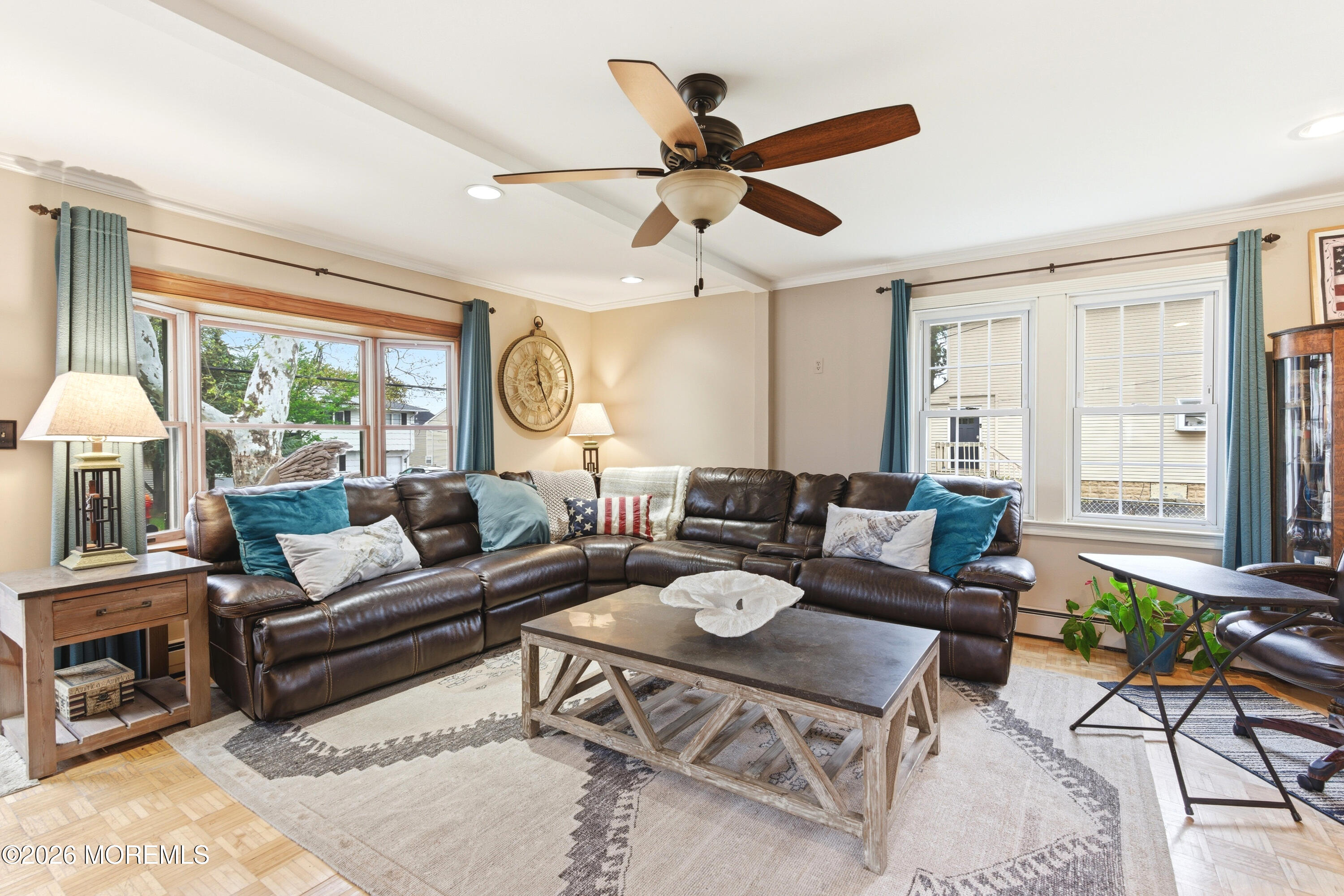 114 Ocean Boulevard Keyport, NJ 07735 - Photo 6 of 41 a living room with furniture a fireplace and a large window
