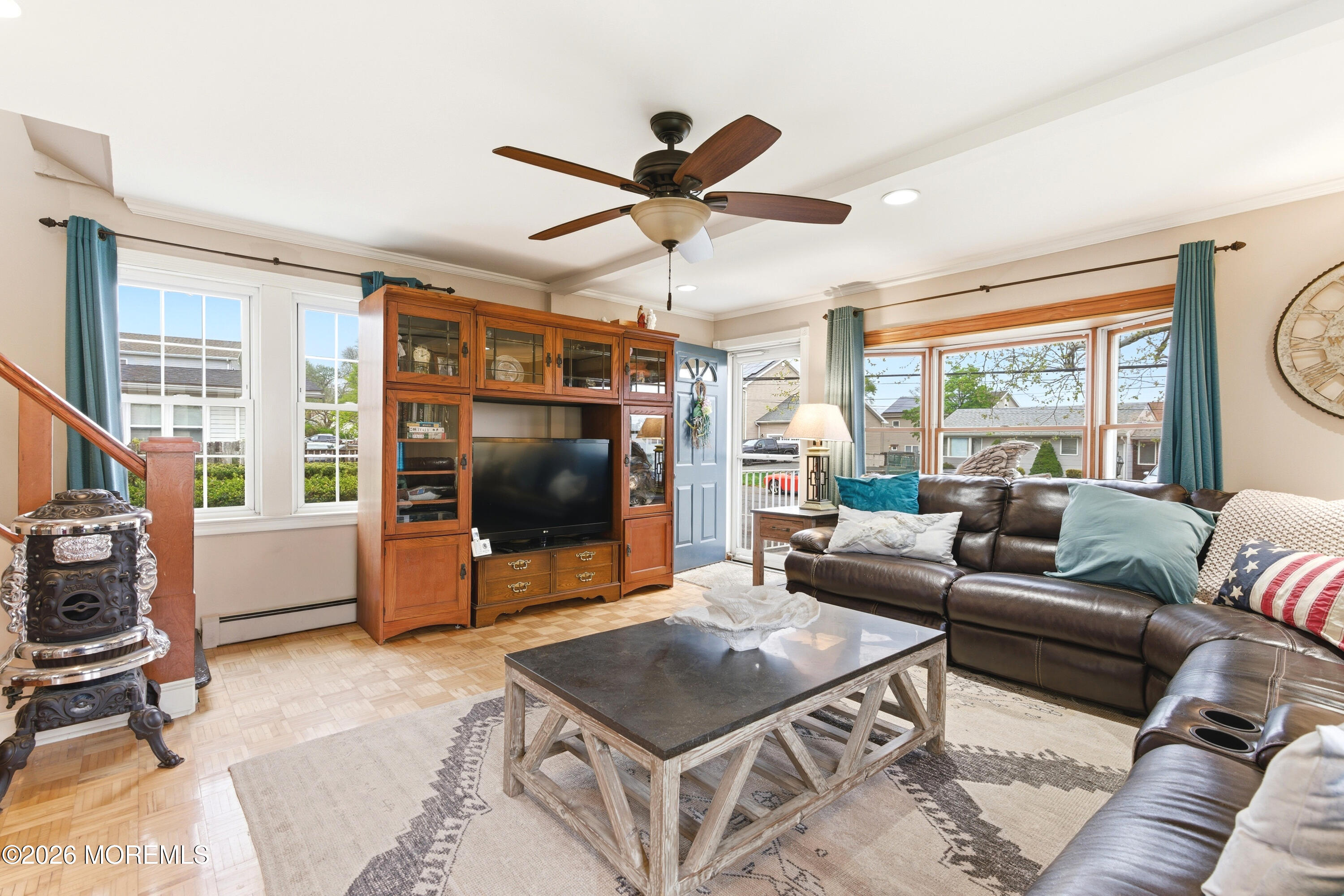 114 Ocean Boulevard Keyport, NJ 07735 - Photo 7 of 41 a living room with furniture and a flat screen tv