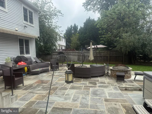 a view of a patio with swimming pool