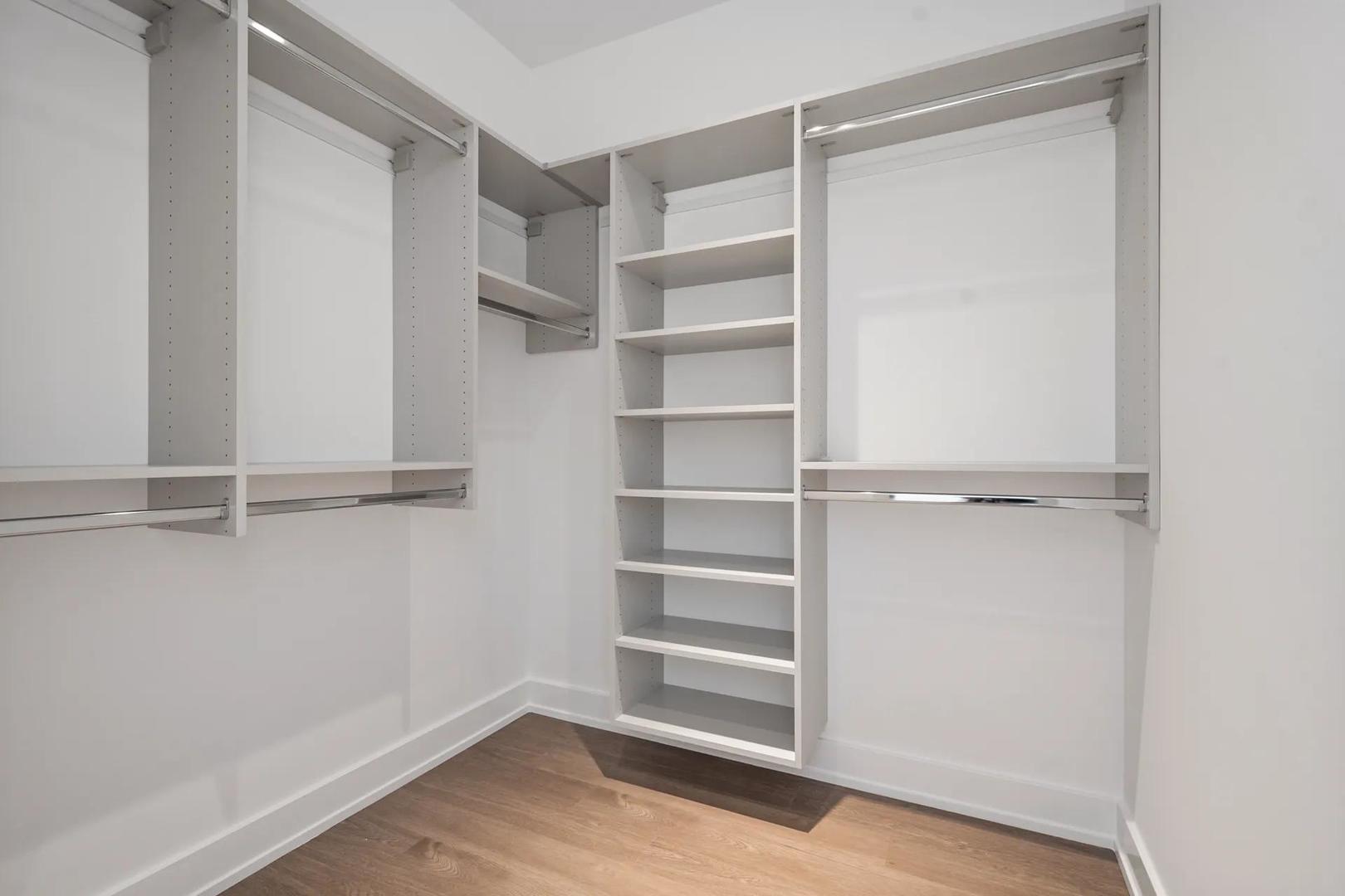 728 Waukegan Road, Unit 206 Deerfield, IL 60015 - Photo 9 of 18 a view of walk in closet with empty racks