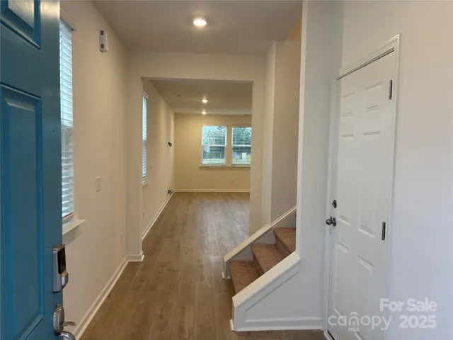 a view of a hallway with entryway
