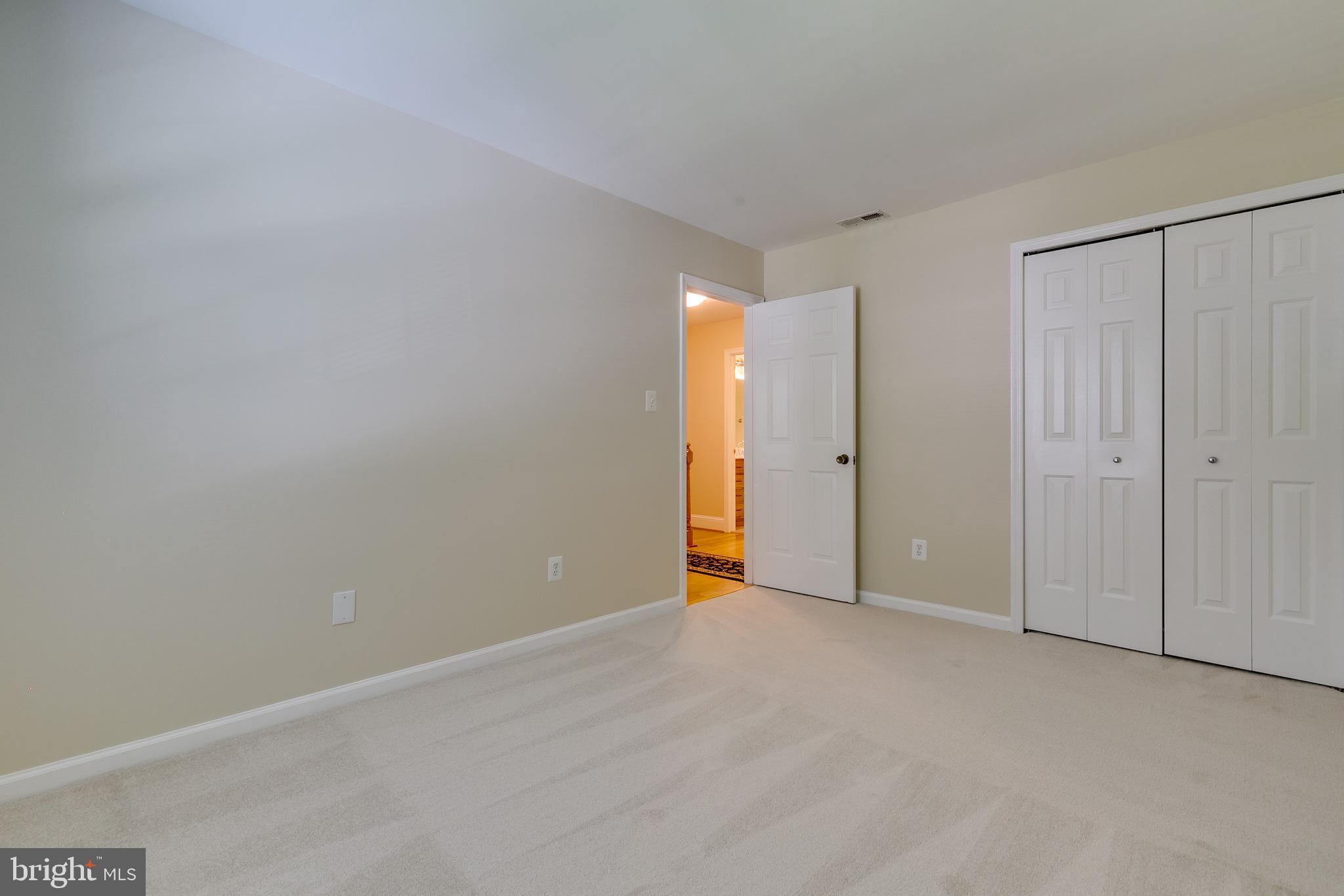 7007 Barnacle Place Burke, VA 22015 - Photo 25 of 49 a view of an empty room