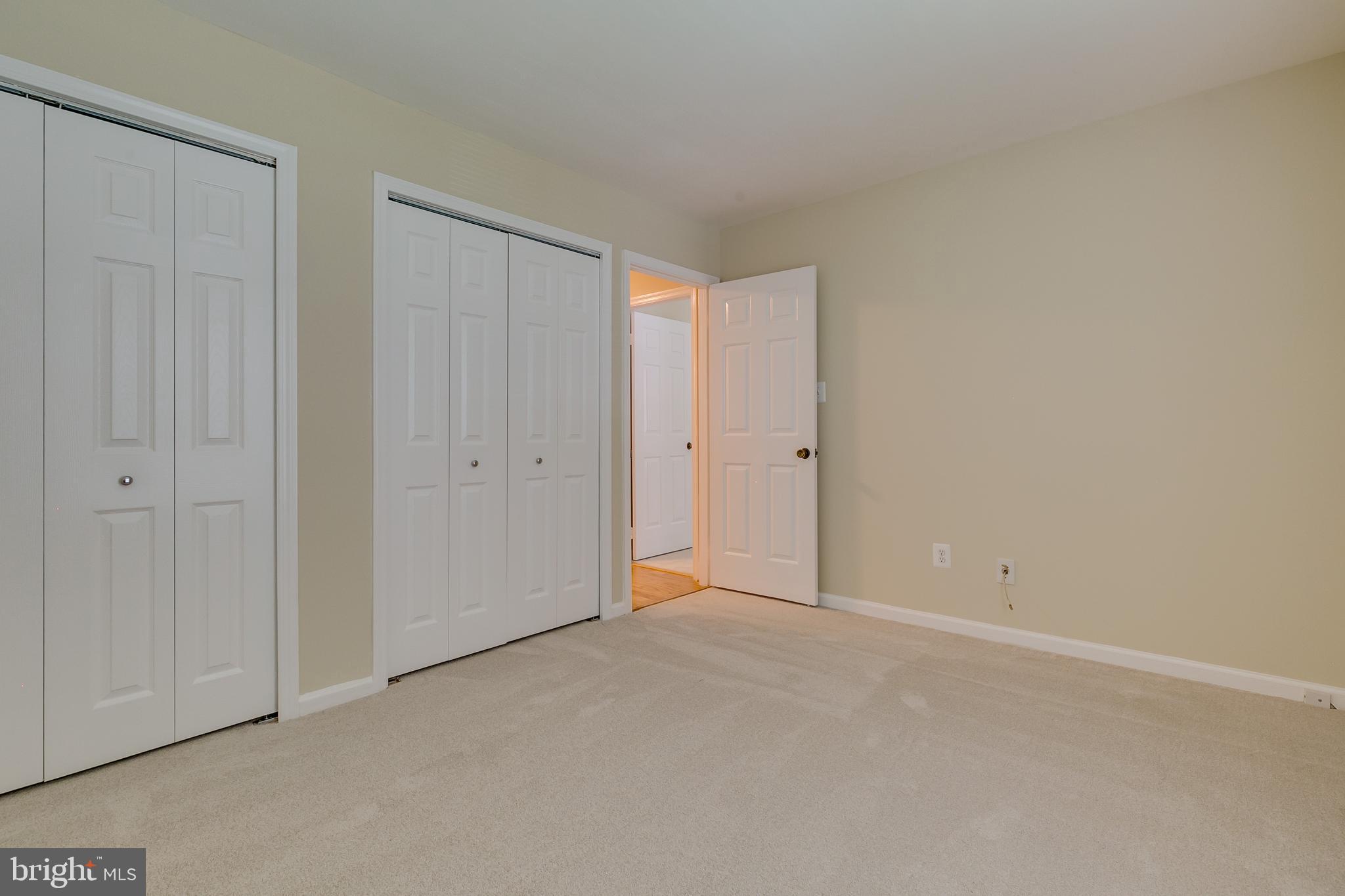 7007 Barnacle Place Burke, VA 22015 - Photo 28 of 49 a view of an empty room