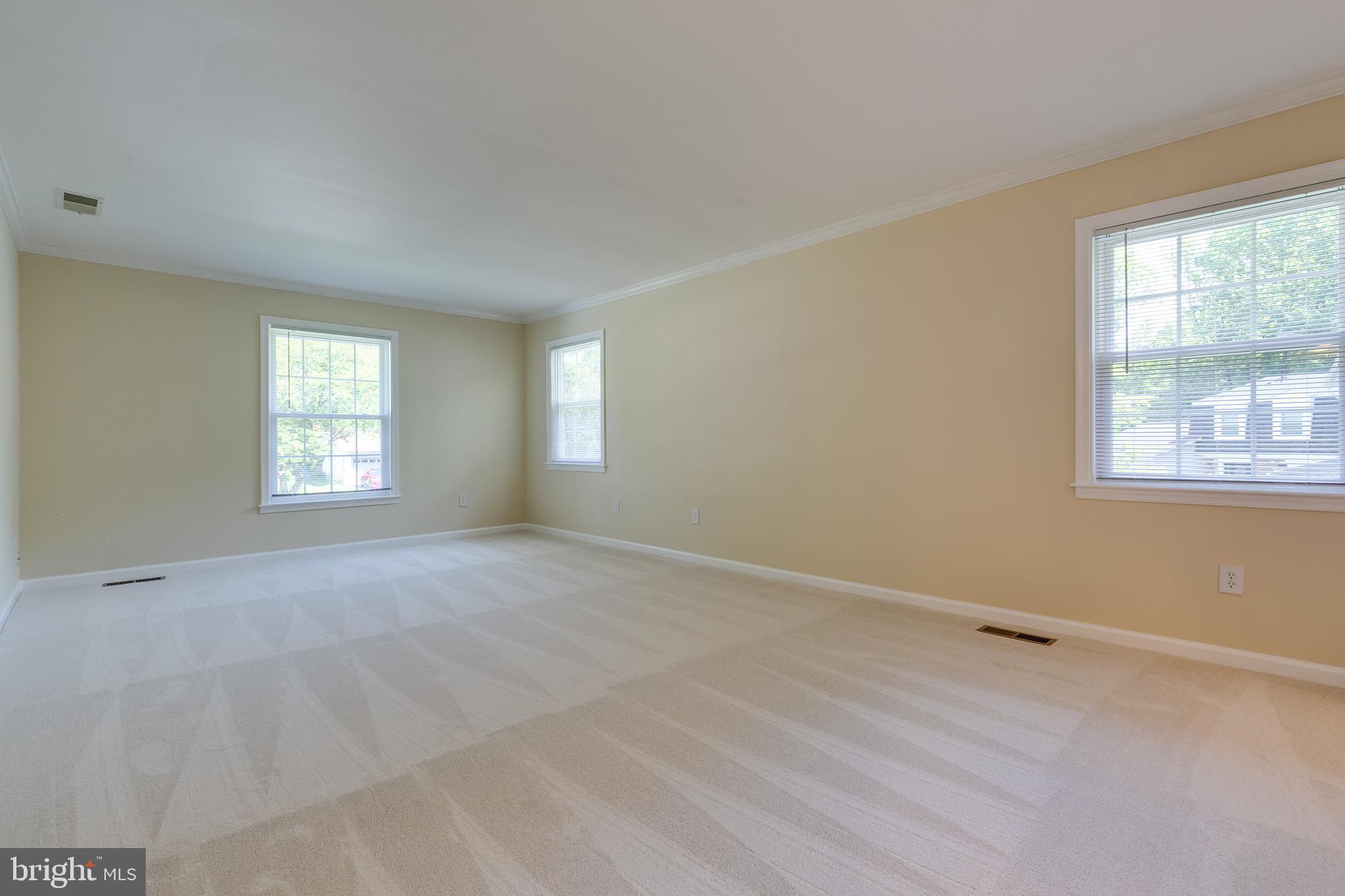 7007 Barnacle Place Burke, VA 22015 - Photo 29 of 49 a view of an empty room with a window