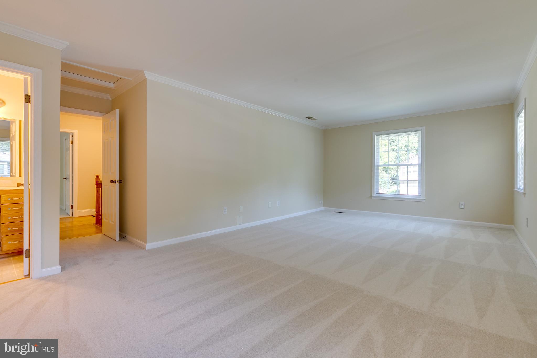 7007 Barnacle Place Burke, VA 22015 - Photo 31 of 49 a view of a big room with windows and closet