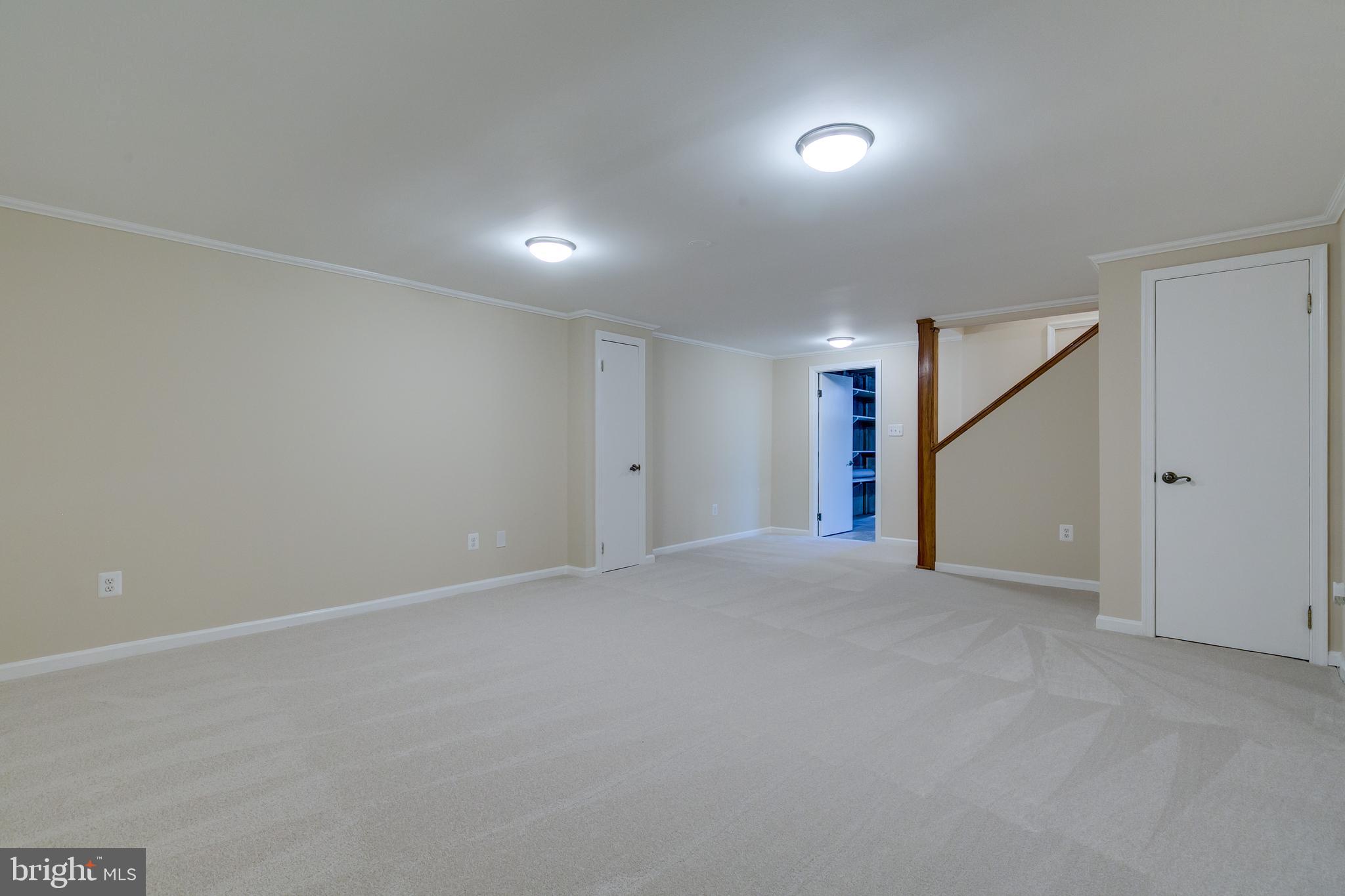 7007 Barnacle Place Burke, VA 22015 - Photo 35 of 49 a view of an empty room