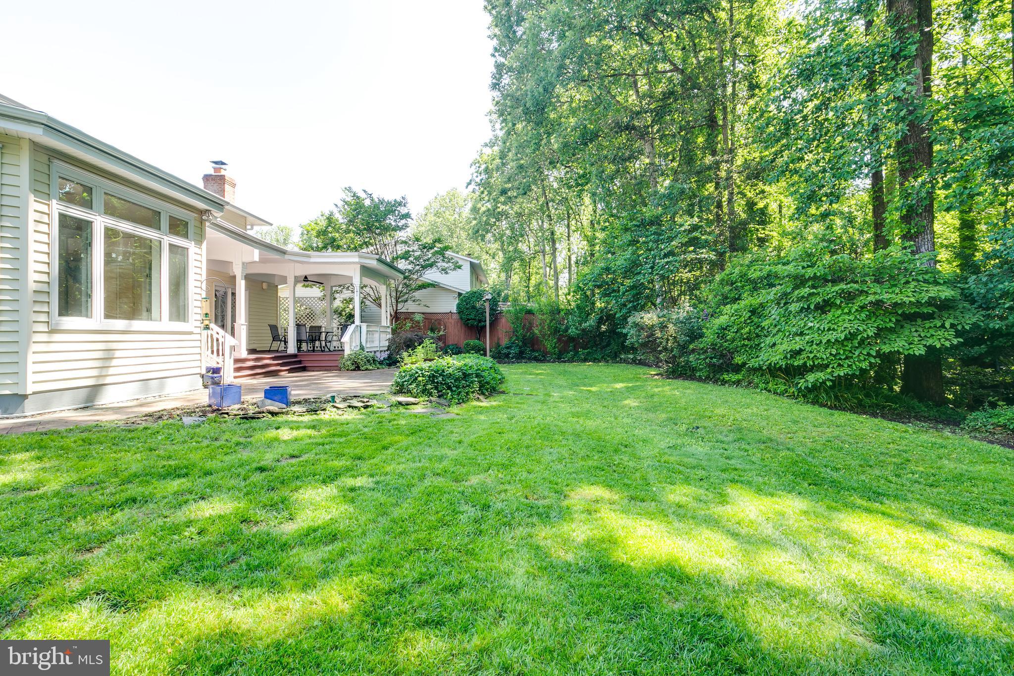 7007 Barnacle Place Burke, VA 22015 - Photo 39 of 49 a house view with a garden space