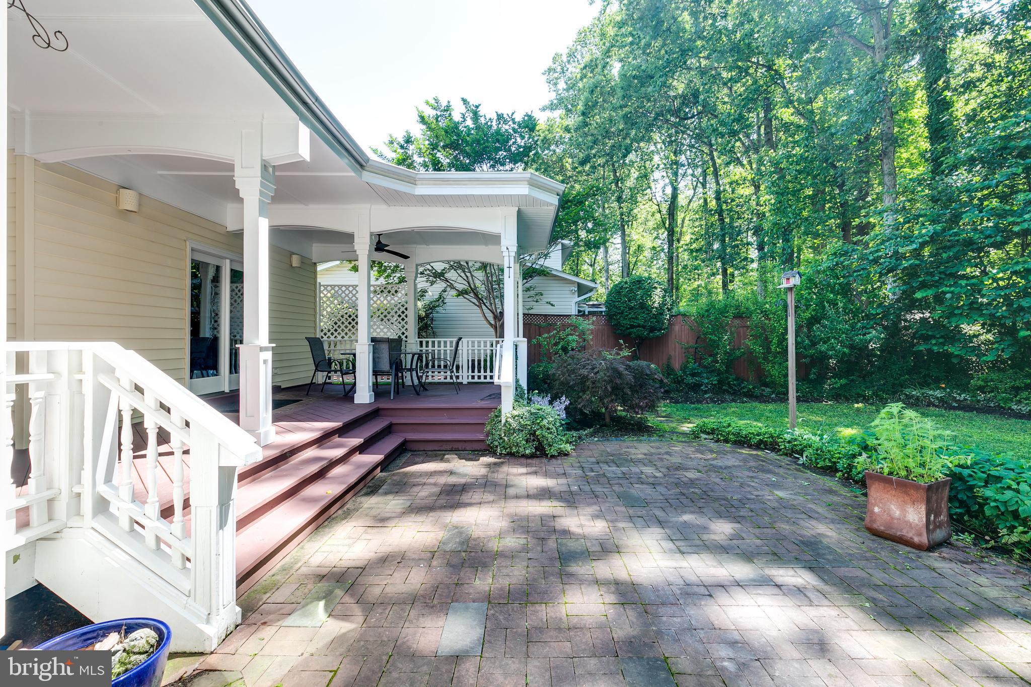 7007 Barnacle Place Burke, VA 22015 - Photo 44 of 49 a view of a house with backyard and sitting area