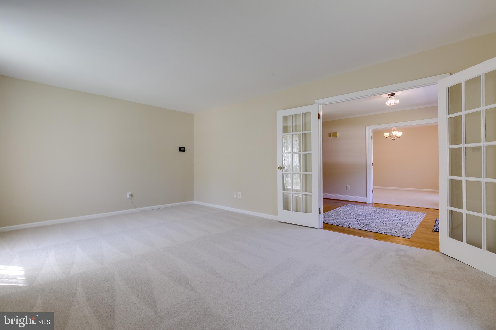 7007 Barnacle Place Burke, VA 22015 - Photo 7 of 49 a view of an empty room