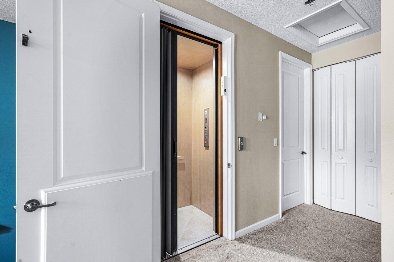 1511 Northwest 48th Lane Boca Raton, FL 33431 - Photo 29 of 45 Elevator 1