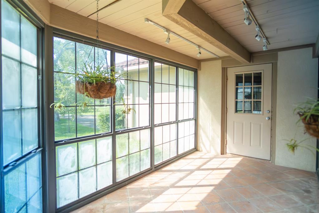 408 Rainey Street Bonham, TX 75418 - Photo 14 of 40 a view of a room with a large window