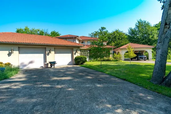 a house view with a garden space