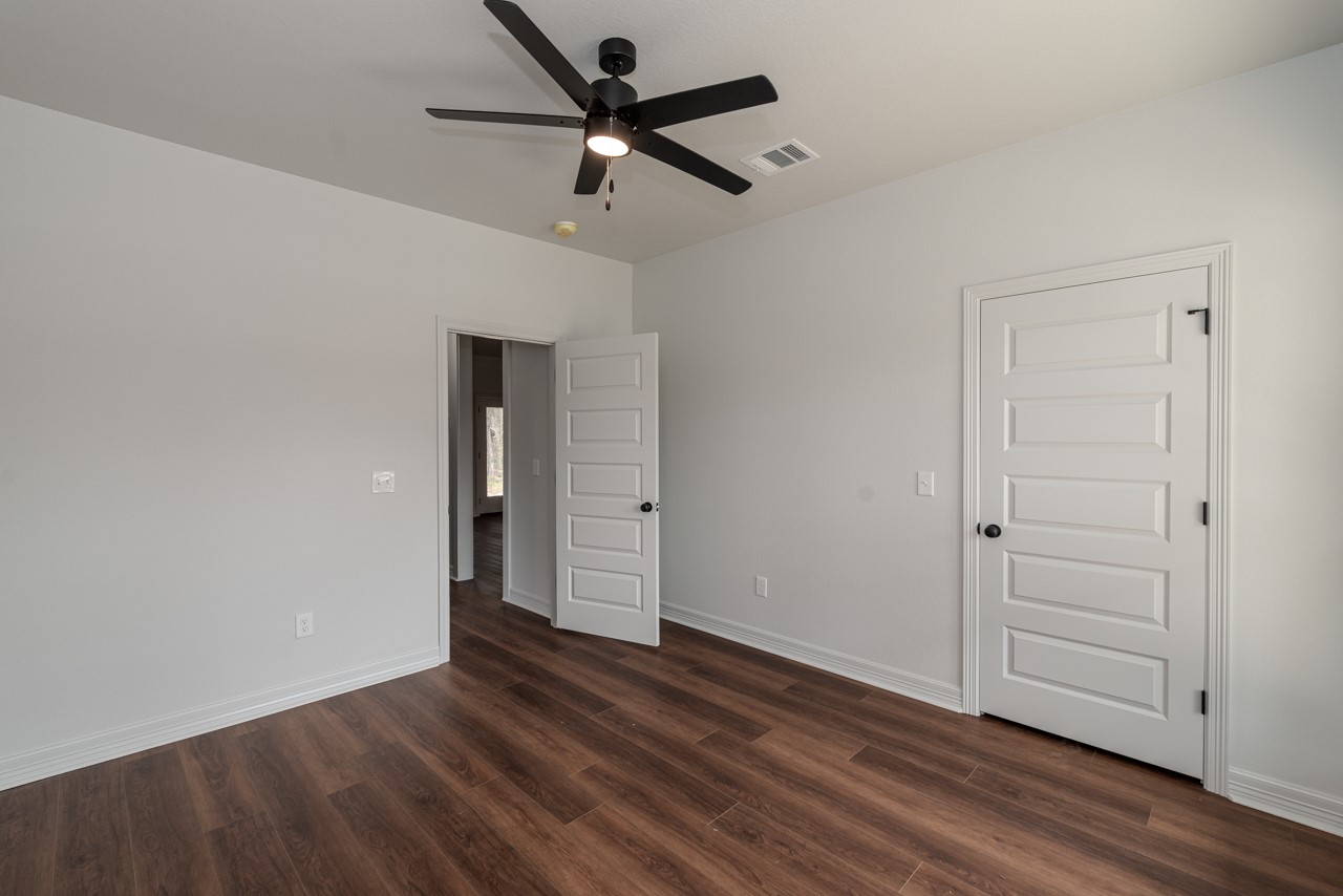 7820 Tolivar Road Beaumont, TX 77713 - Photo 15 of 47 wooden floor in an empty room