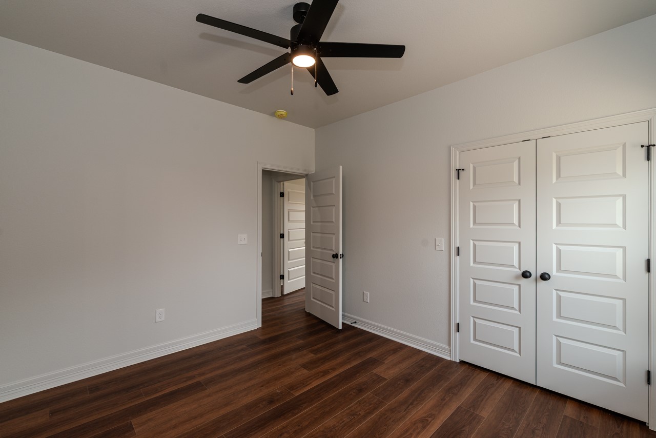 7820 Tolivar Road Beaumont, TX 77713 - Photo 18 of 47 wooden floor in an empty room