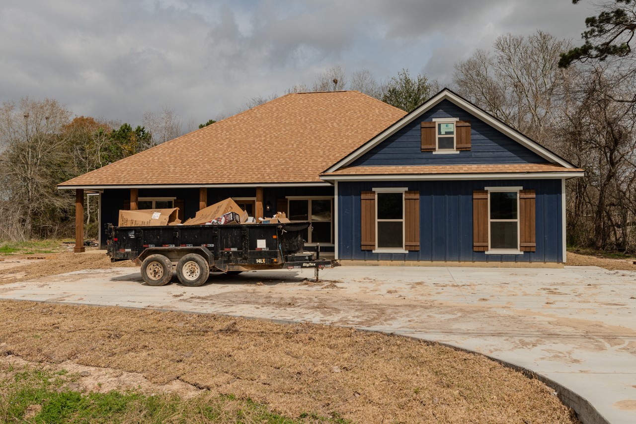 7820 Tolivar Road Beaumont, TX 77713 - Photo 2 of 47 front view of a house with a yard