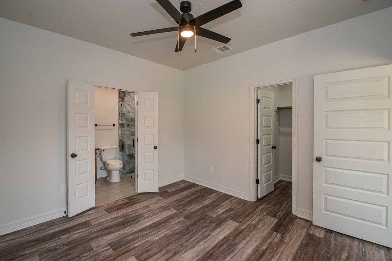 7820 Tolivar Road Beaumont, TX 77713 - Photo 25 of 47 wooden floor in an empty room