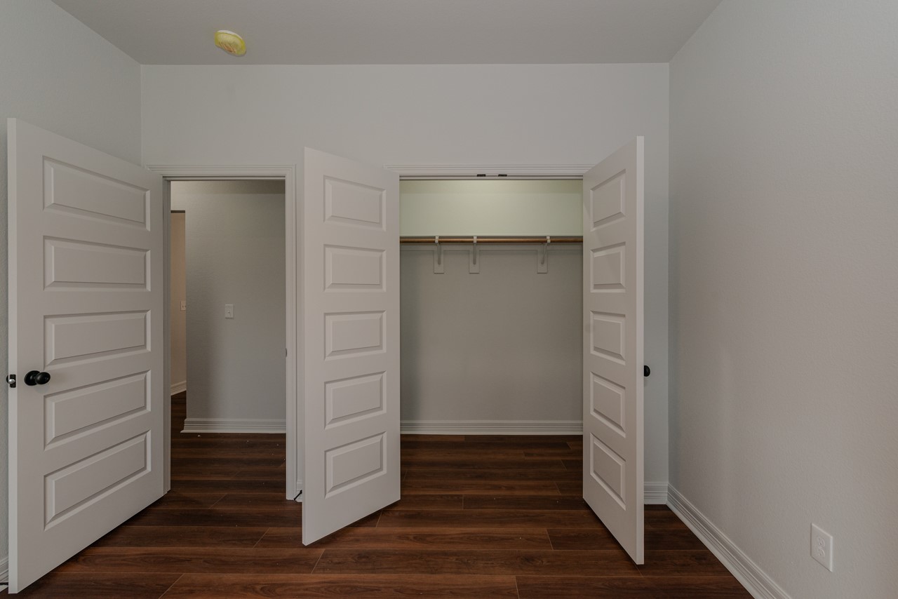 7820 Tolivar Road Beaumont, TX 77713 - Photo 27 of 47 a view of wooden closet