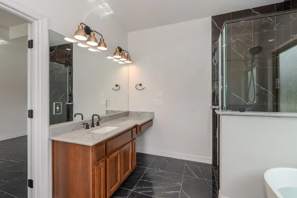 a bathroom with a sink and a mirror