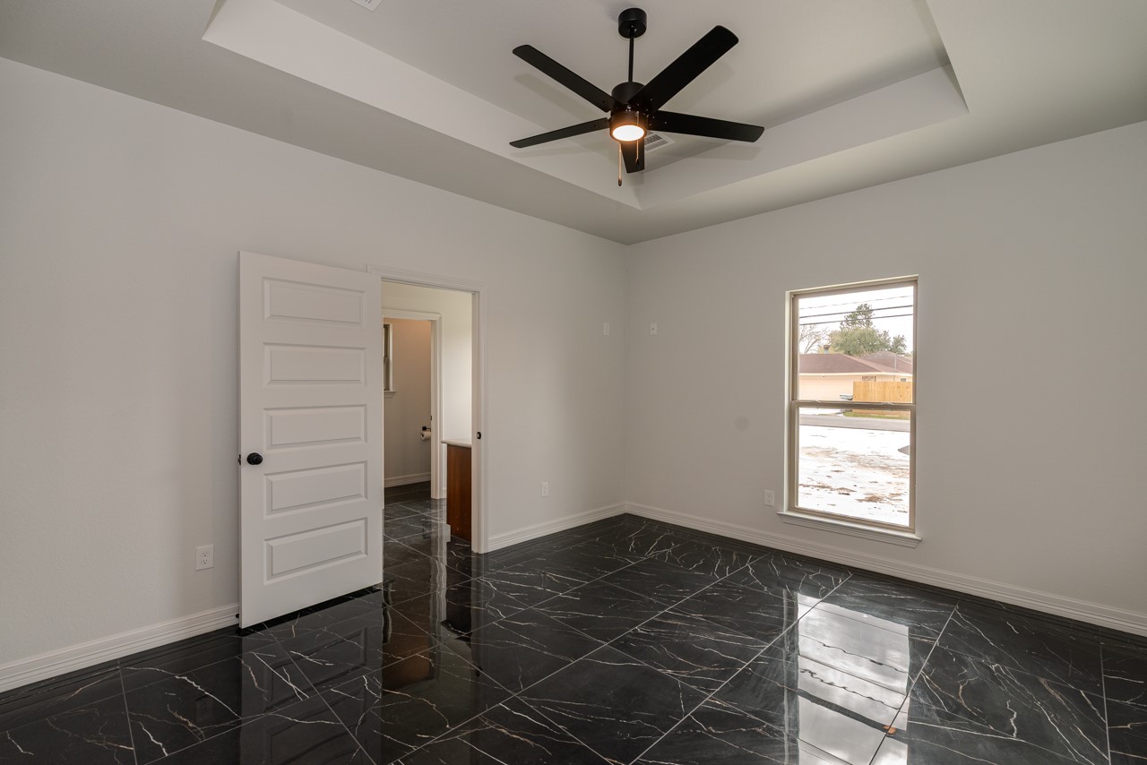 7820 Tolivar Road Beaumont, TX 77713 - Photo 40 of 47 an empty room with closet and windows