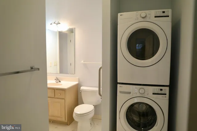 a bathroom with a toilet and a sink