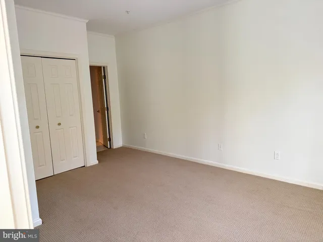 an empty room with closet