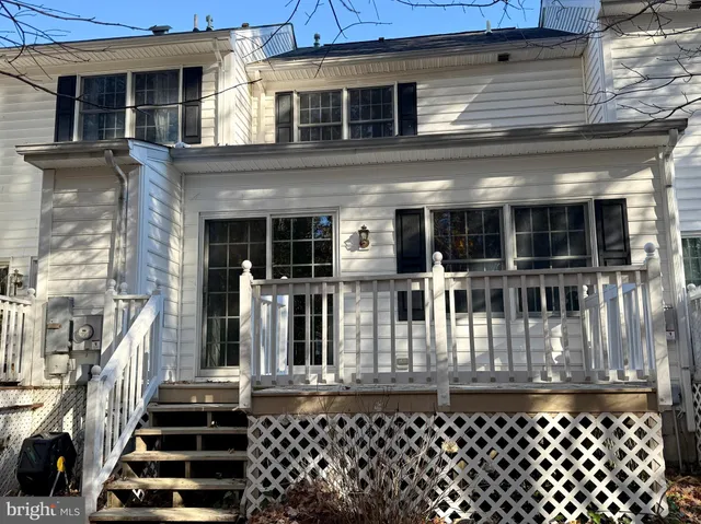 a front view of a building with glass windows