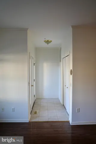 an entryway view with wooden floor