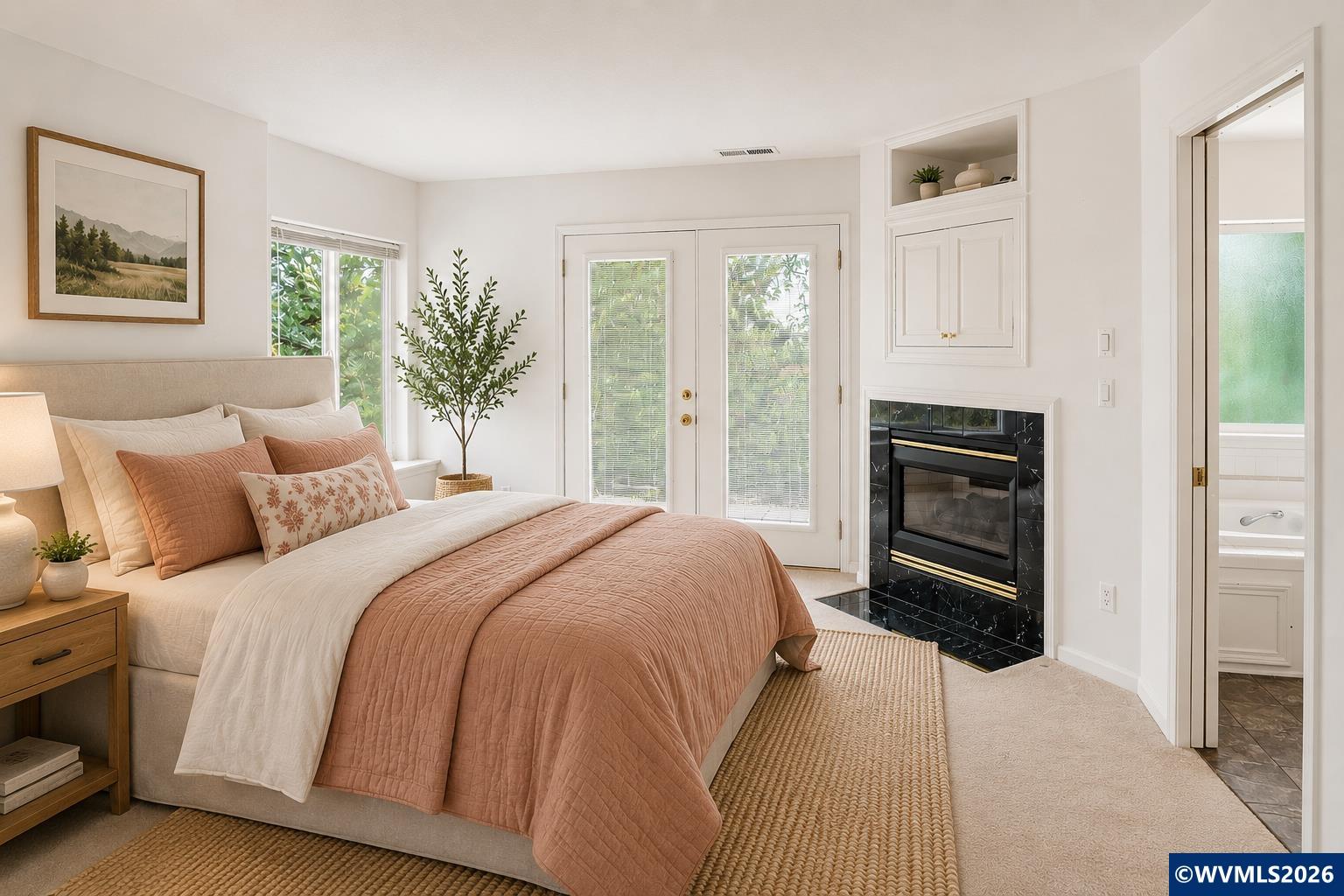1299 Twin Hills Road Southeast Jefferson, OR 97352 - Photo 25 of 47 a bedroom with a bed and a fireplace