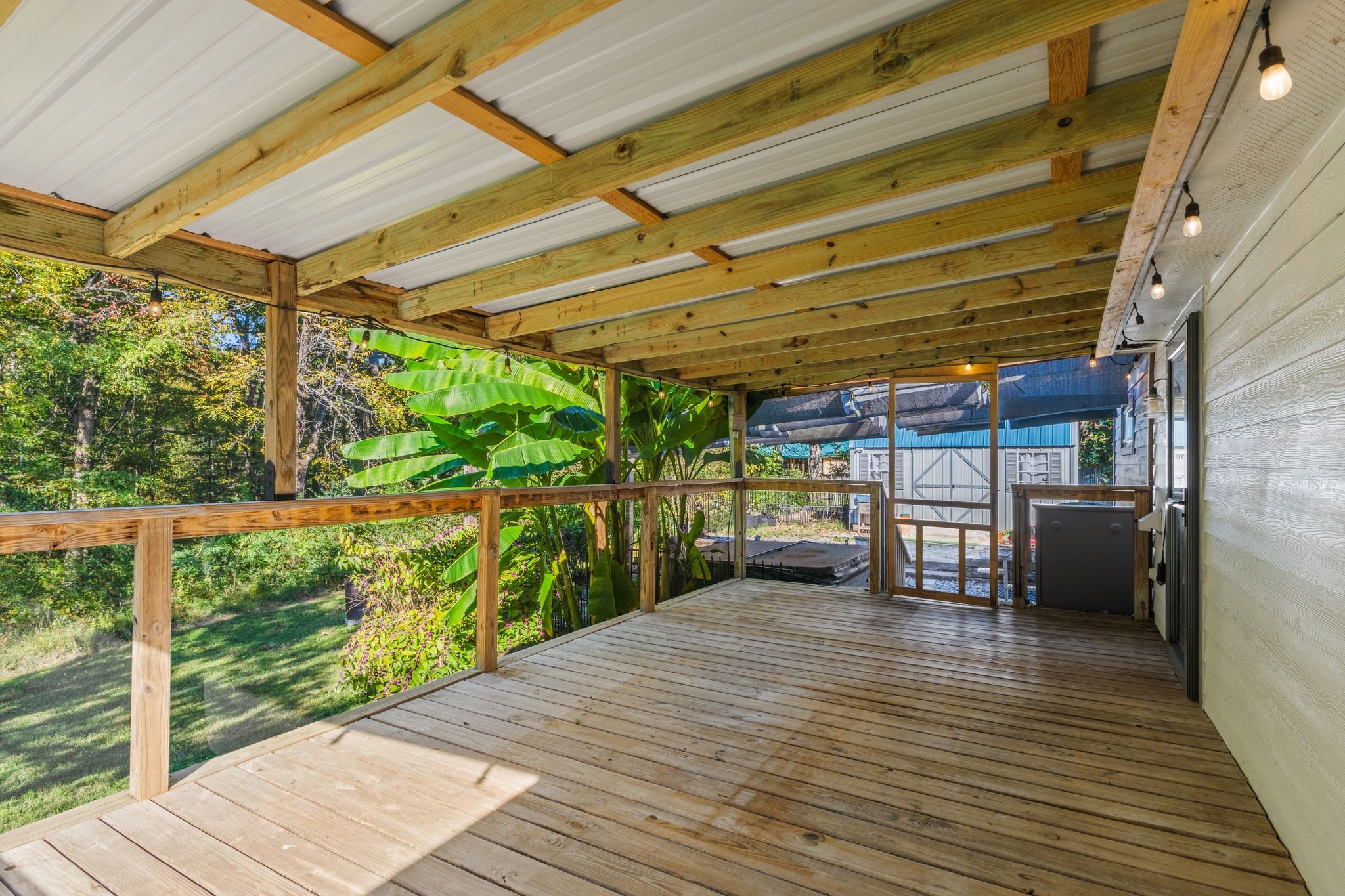 10209 New Hope Road Bon Aqua, TN 37025 - Photo 20 of 27 a view of a room with wooden floor