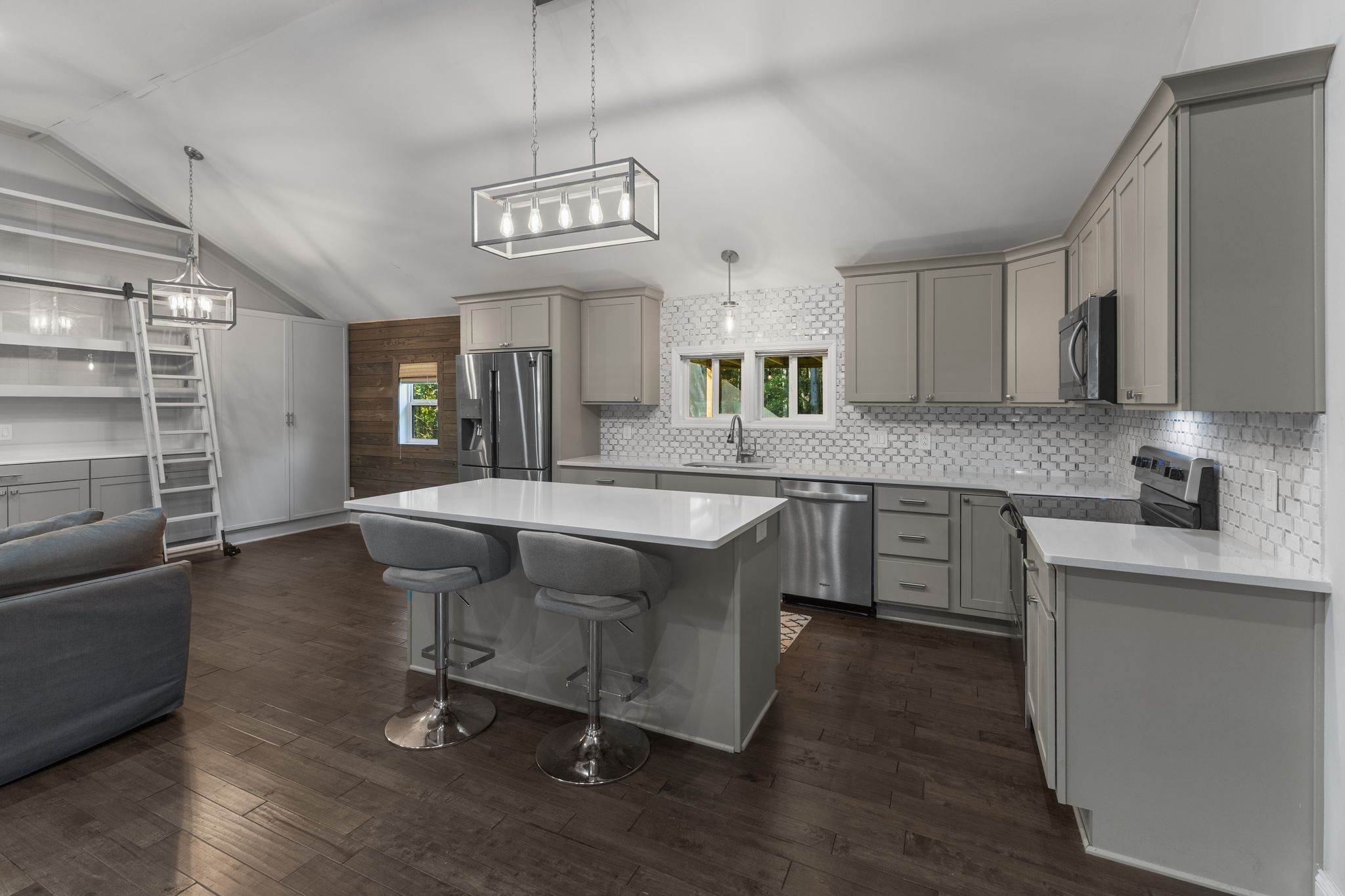 10209 New Hope Road Bon Aqua, TN 37025 - Photo 2 of 27 a open kitchen with granite countertop a sink cabinets and wooden floor