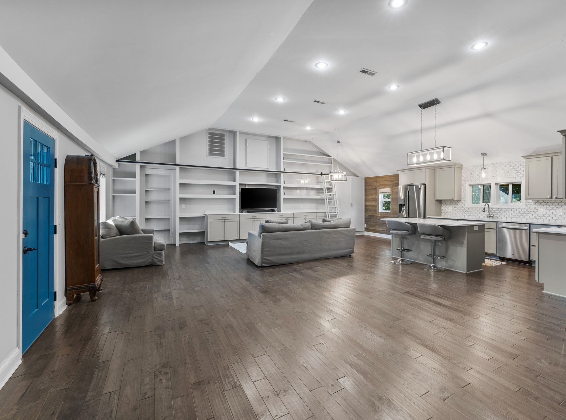 10209 New Hope Road Bon Aqua, TN 37025 - Photo 4 of 27 a living room with furniture and kitchen view with wooden floor