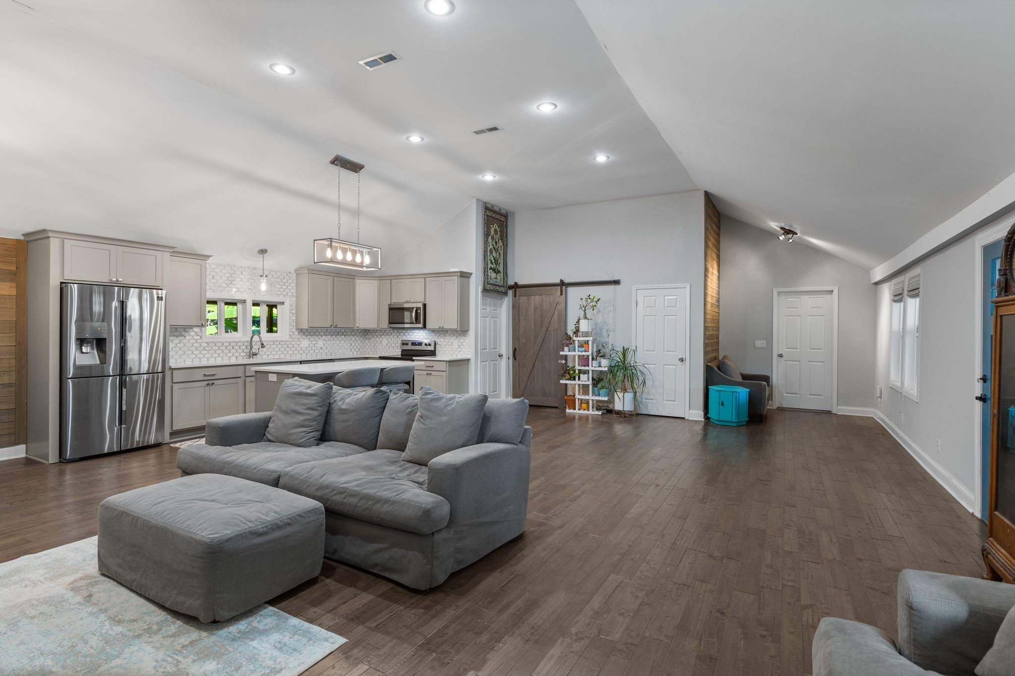 10209 New Hope Road Bon Aqua, TN 37025 - Photo 5 of 27 a living room with furniture and kitchen view