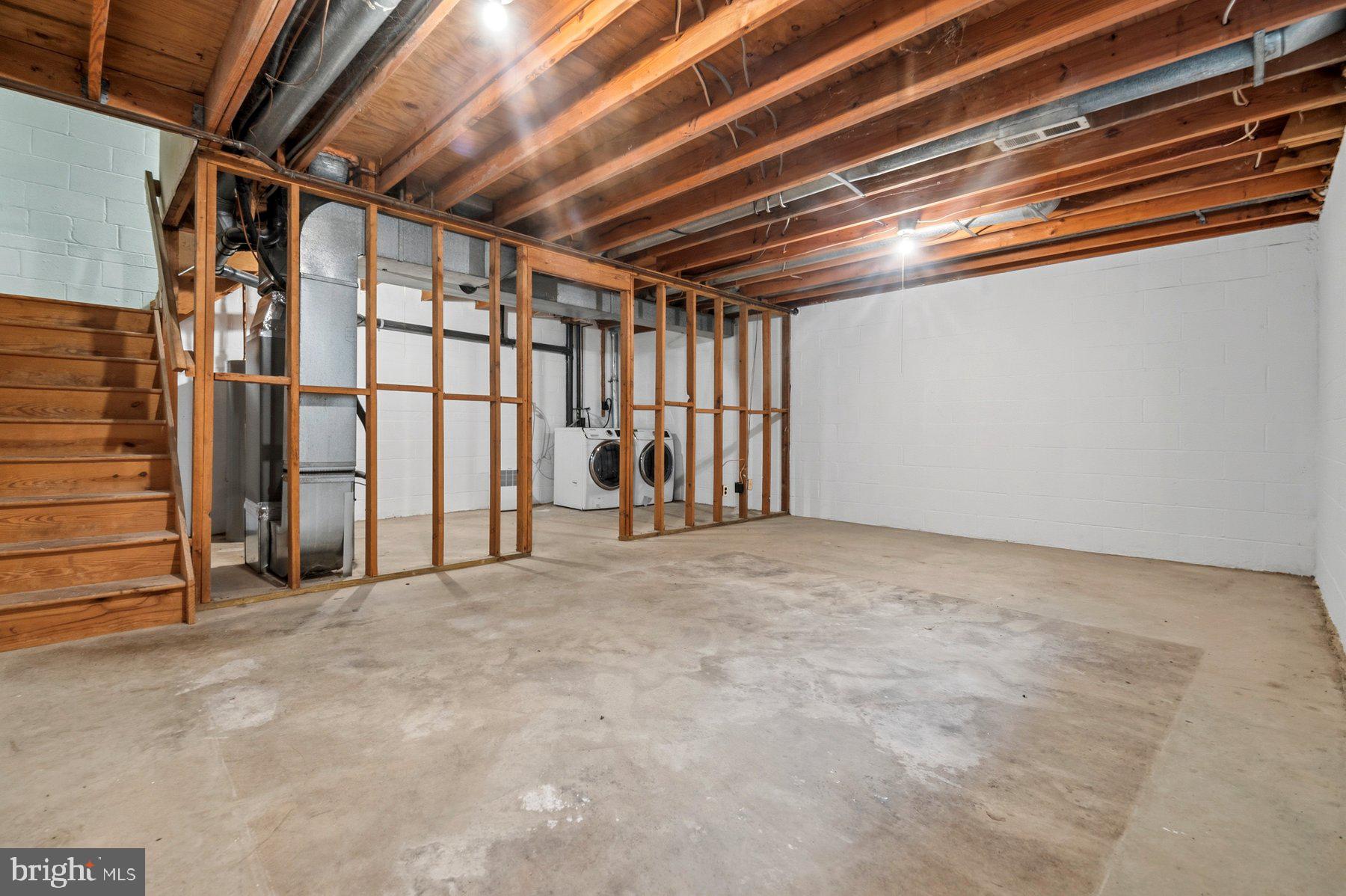 9080 Moonshine Hollow, Unit F Laurel, MD 20723 - Photo 24 of 24 Spacious unfinished basement ready for ideas.