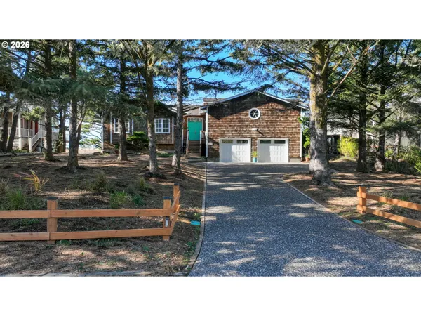 a black and white photo of a house