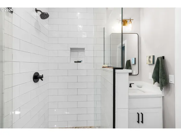 a bathroom with a sink and mirror